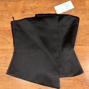 A black strapless top